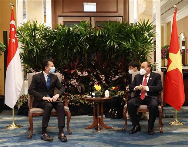 越南国家主席阮春福会见新加坡金融、能源企业领导 hinh anh 5