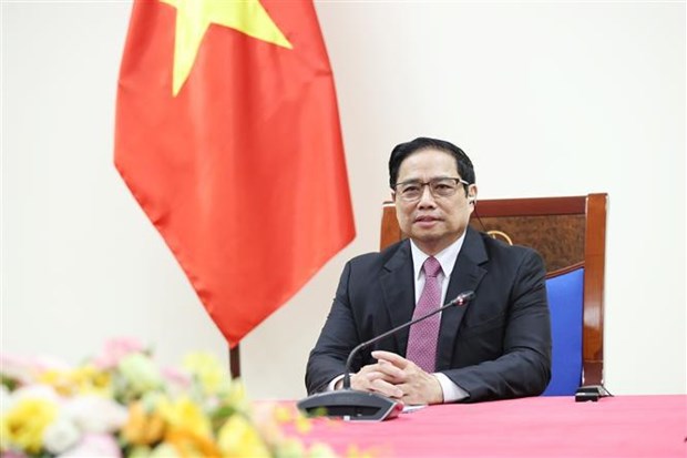 政府总理范明政：越南基本完成5至12岁儿童新冠疫苗接种准备工作 hinh anh 1