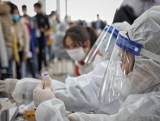 越南政府颁布关于2022-2023年新冠肺炎疫情防控计划的决议 hinh anh 1