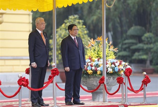 范明政主持仪式 欢迎马来西亚总理伊斯梅尔·萨布里·雅可布到访 hinh anh 3