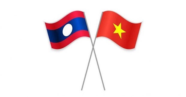 越共中央委员会致电祝贺老挝人民革命党建党67周年 hinh anh 1