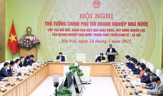 越南政府总理范明政主持全国国有企业代表视频会议 hinh anh 1