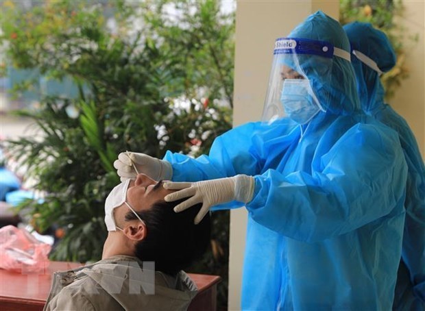 3月27日越南新增本土确诊病例较昨日下降1.1万多例 致死率降至0.5% hinh anh 1