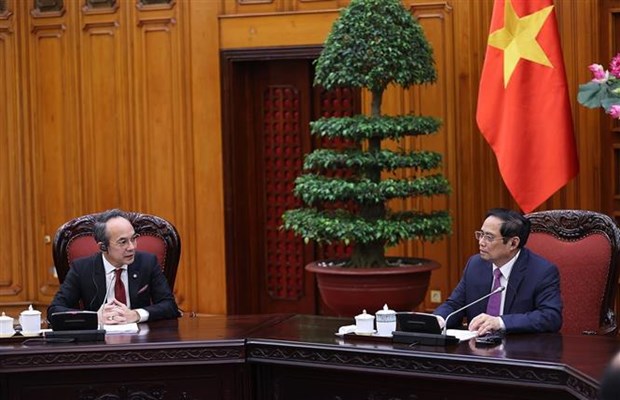 越南政府总理范明政会见泰国驻越大使巴兰库拉 hinh anh 1