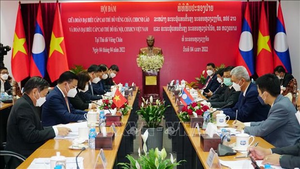 越南首都河内与老挝首都万象加强合作 hinh anh 1