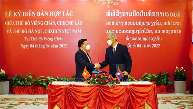越南首都河内与老挝首都万象加强合作 hinh anh 2