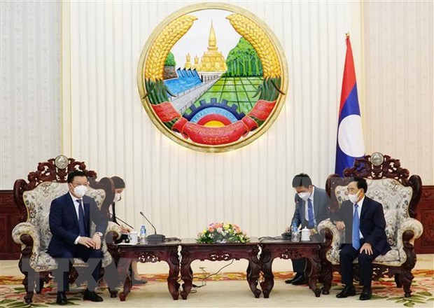 老挝领导高度评价河内与万象之间的密切合作关系 hinh anh 2