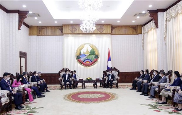老挝总理高度赞赏越南工贸部与老挝能矿部和工贸部合作成果 hinh anh 1