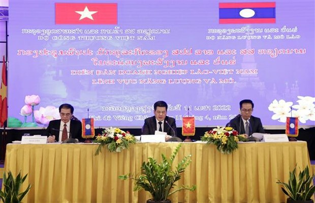 老挝总理高度赞赏越南工贸部与老挝能矿部和工贸部合作成果 hinh anh 2