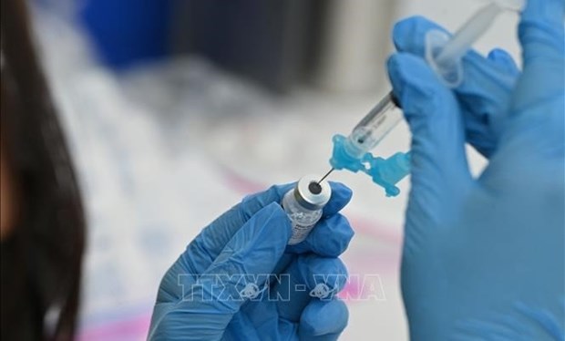 越南胡志明市即将为5至12岁以下儿童接种新冠疫苗 hinh anh 1