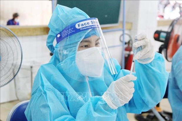 21日越南新增新冠肺炎确诊病例约1.2万 hinh anh 1
