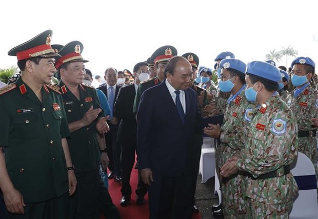 越南国家主席阮春福出席联合国维和部队出征仪式 hinh anh 1