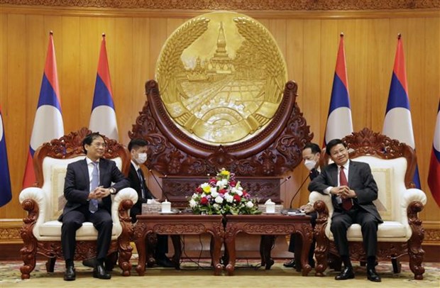 越南外交部部长裴青山礼节性拜会老挝高层领导 hinh anh 1