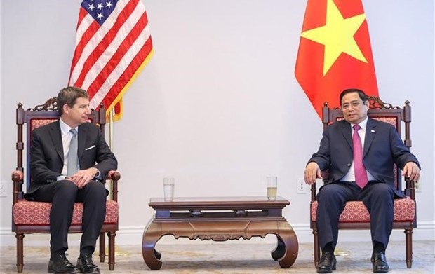 越南政府总理范明政会见美国国际开发金融公司首席执行官 hinh anh 2