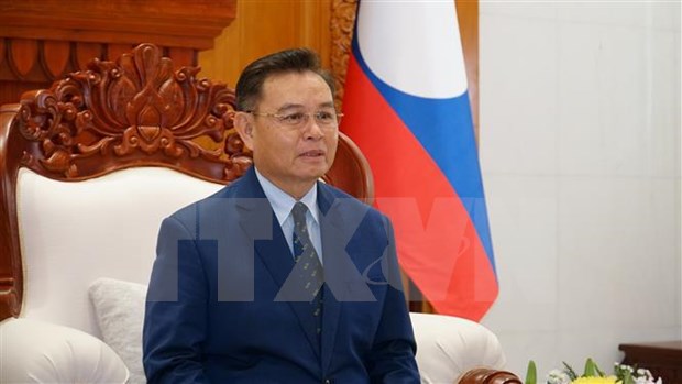 老挝国会主席：越南国会主席访问老挝为促进两国伟大友谊作出积极贡献 hinh anh 2