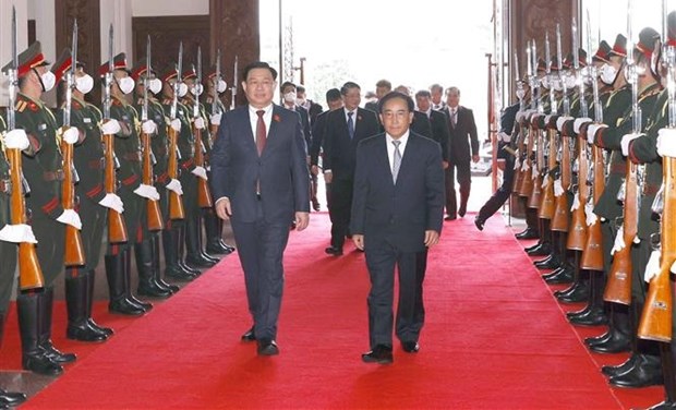 越南国会主席王廷惠会见老挝政府总理潘坎·维帕万 hinh anh 1