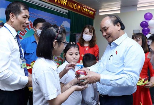 越南国家主席阮春福：为儿童创造安全、健康、友好的生活环境 hinh anh 2