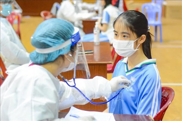 越南全国新增确诊病例1千多例 超9千例治愈病例 hinh anh 1