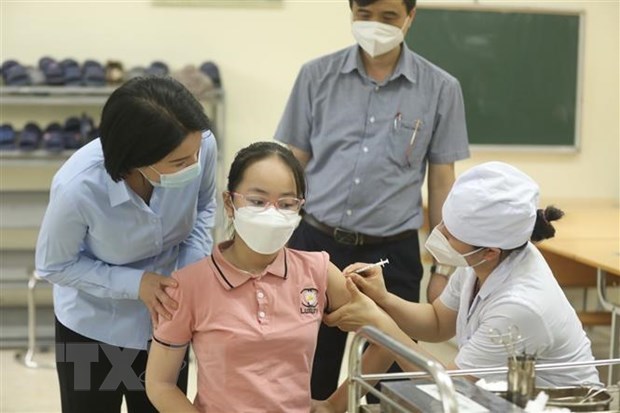 越南全国新增确诊病例881例 超9千例治愈病例 hinh anh 1
