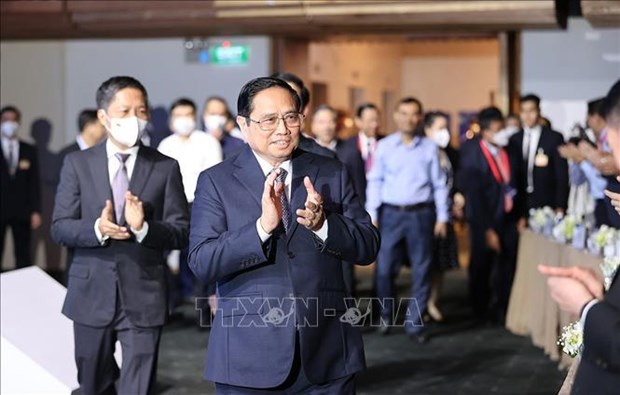 越南政府总理范明政出席第四次越南经济论坛 hinh anh 1
