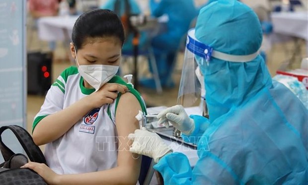 河内市开展第四针新冠疫苗接种工作 hinh anh 1
