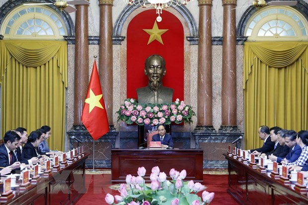 越南国家主席阮春福会见老挝国家主席办公厅主任肯玛尼•波尔塞娜 hinh anh 2