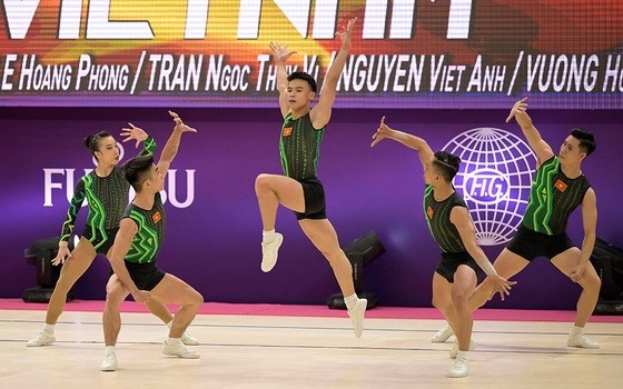 越南健美操队在2022年世界健美操锦标赛夺得金牌 hinh anh 1