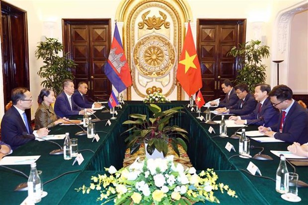 越南政府副总理黎明慨会见柬埔寨副首相梅森安 hinh anh 1
