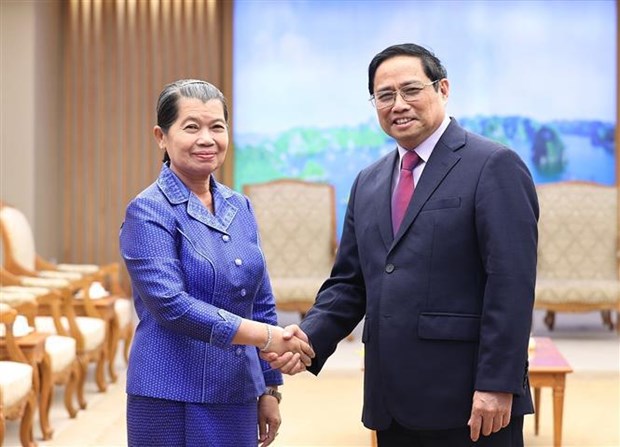 越南政府总理范明政会见柬埔寨副首相梅森安 hinh anh 1