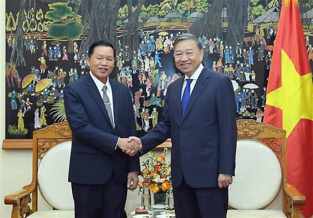 越南与老挝两国公安部加强合作 hinh anh 1