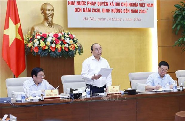 国家主席阮春福就建设和完善法治国家战略与国会和越南祖国阵线进行座谈 hinh anh 1