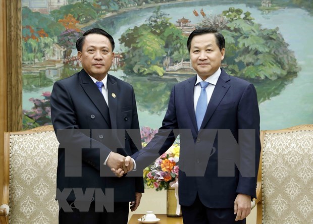 政府副总理黎明慨：老挝面临困难，越南愿意分担 hinh anh 1