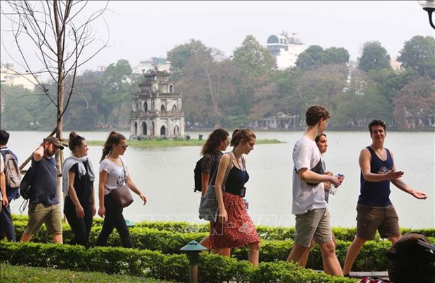 越南2022年前7月接待国际游客量超95.4万人 hinh anh 2
