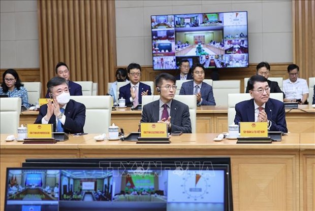 越南政府总理范明政与韩国企业代表举行对话会 hinh anh 3