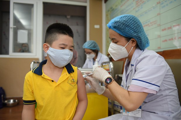 胡志明市要求各地增设儿童新冠疫苗接种点 hinh anh 1