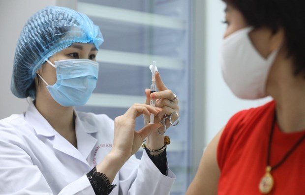 胡志明市新冠肺炎确诊病例再次呈现上升趋势 各地增设疫苗接种点 hinh anh 2