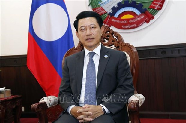 老挝政府副总理：越南与老挝为东盟共同体建设作出了巨大贡献 hinh anh 1