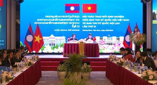 越南国会办公厅与老挝国会秘书处举行工作经验交流研讨会 hinh anh 1