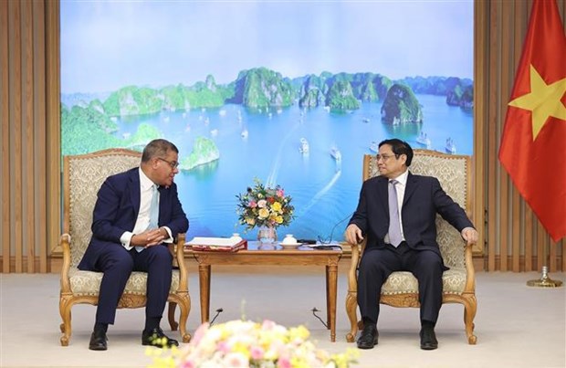 越南政府总理范明政会见COP26主席阿洛克·夏尔马 hinh anh 1