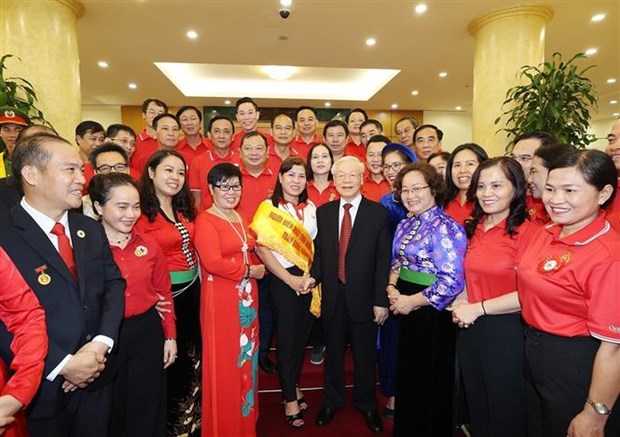 越共中央总书记阮富仲会见越南红十字会第十一次全国会员代表大会代表 hinh anh 1