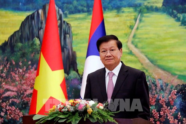 越老建交60周年：老挝媒体纷纷报道两国领导人发表的讲话 hinh anh 2