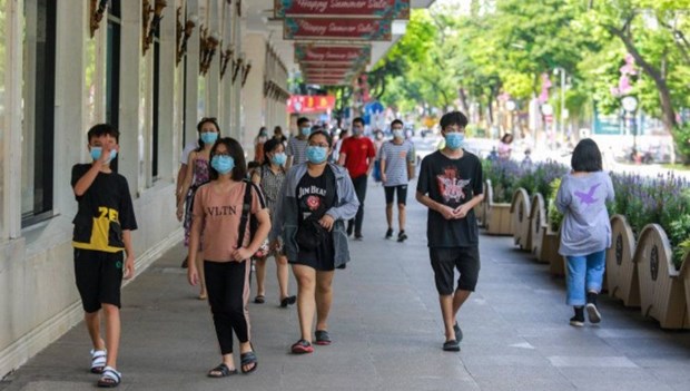 越南卫生部发文明确在防疫中必戴口罩的人员和场所 hinh anh 1