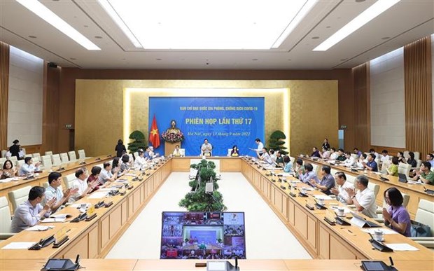 越南政府总理范明政主持新冠肺炎疫情防控视频会议 hinh anh 2