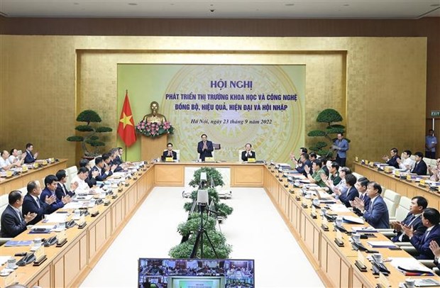 越南政府总理范明政主持科技市场发展会议 hinh anh 2