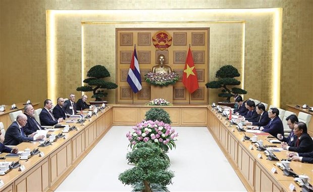 越南政府总理范明政举行仪式欢迎古巴总理曼努埃尔•马雷罗•克鲁斯访越 hinh anh 3