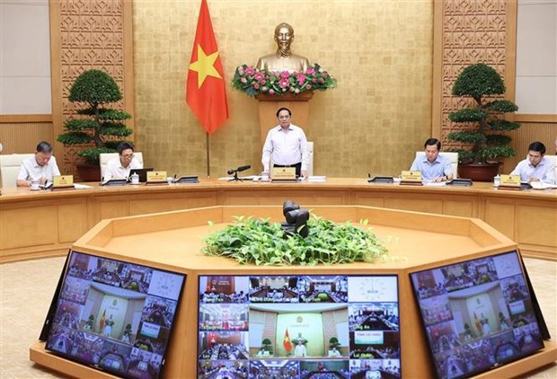 范明政总理：力争实现2022年经济社会发展目标 为2023年的发展注入动力 hinh anh 1