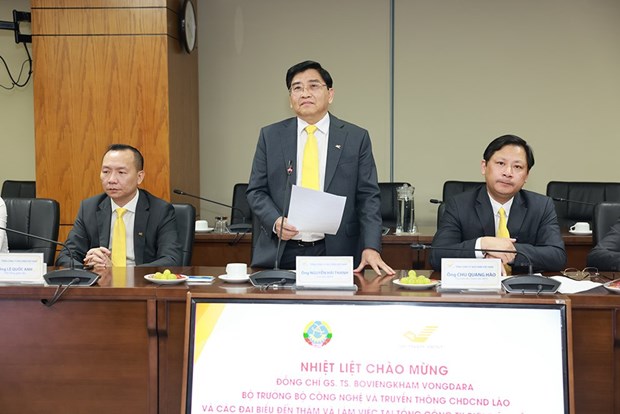 越南邮政总公司协助老挝邮政总公司推进数字化转型 hinh anh 1