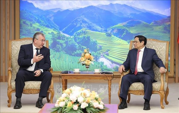 越南政府总理范明政会见比利时瓦隆-布鲁塞尔大区联盟的首席大臣皮埃尔-伊夫·热霍莱特 hinh anh 1