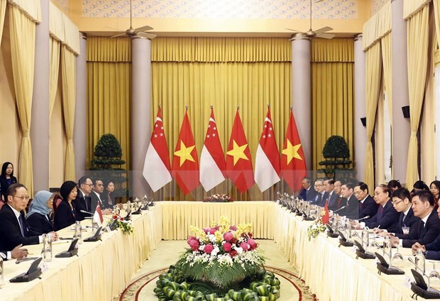 越南国家主席阮春福与新加坡总统雅各布举行会谈 hinh anh 2