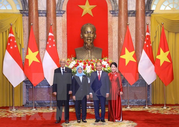 越南国家主席阮春福与新加坡总统雅各布举行会谈 hinh anh 1